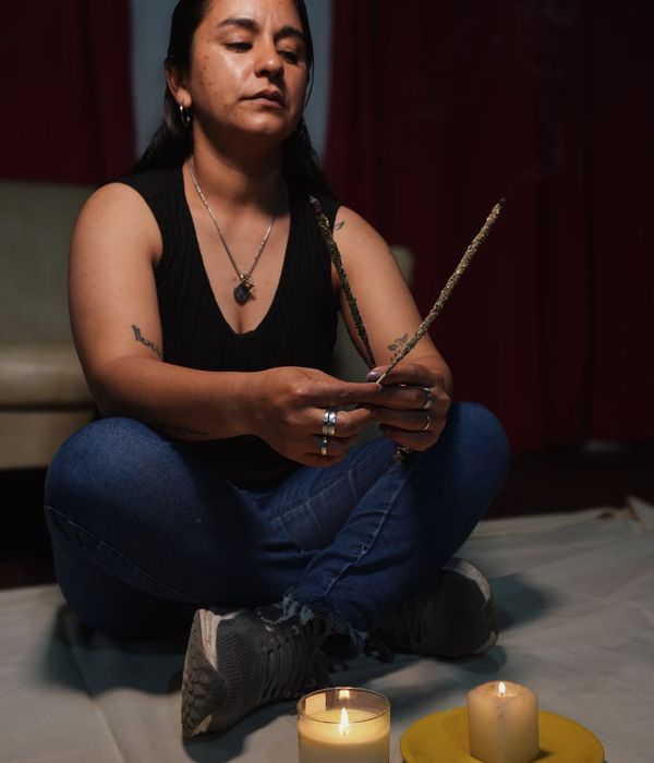 Woman in a calm yoga pose, embodying harmony and balance.